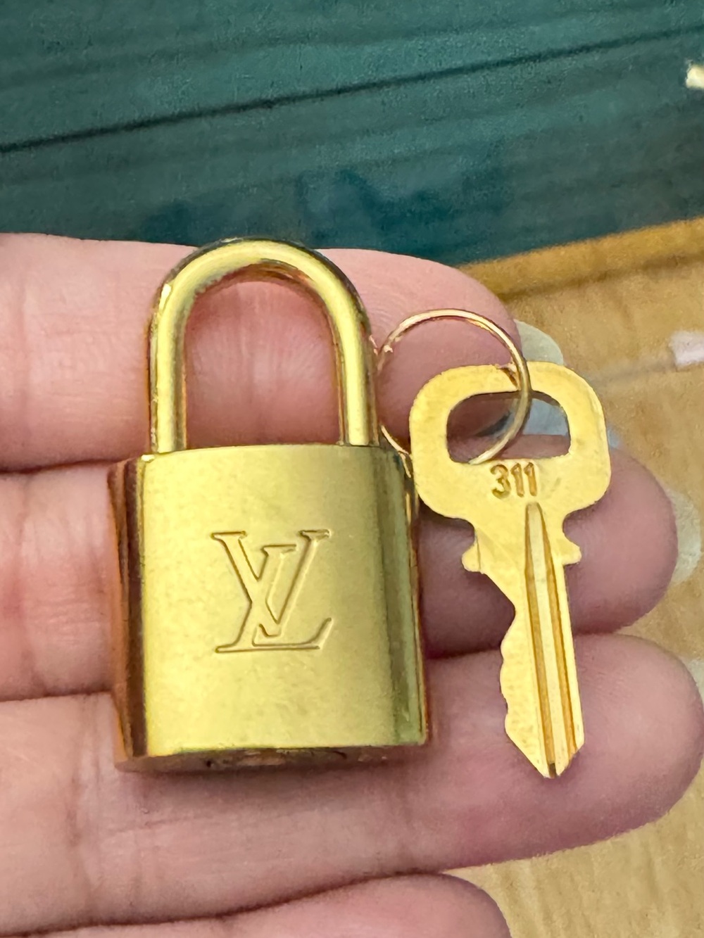 #311 Louis Vuitton Gold-tone Padlock and Key Set
